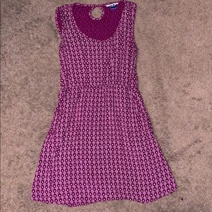 Pocket sleeveless cinched dress.